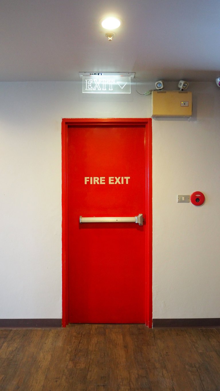 Fire door installation in Coquitlam with code-compliant fire exit door and safety certification