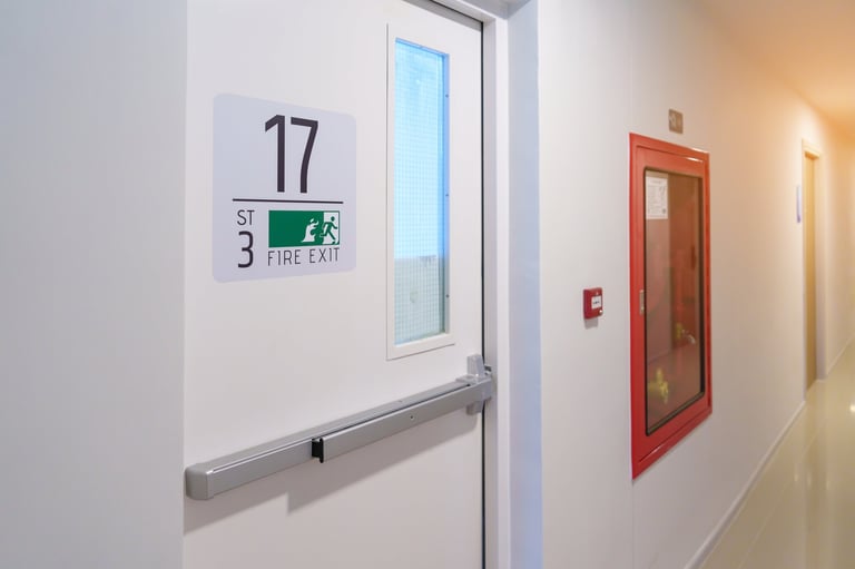 Fire exit door with fire exit sign in commercial building