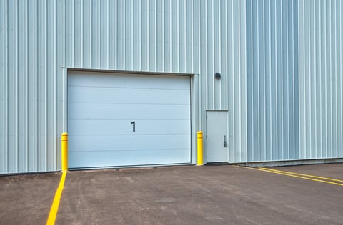 Commercial building with overhead door