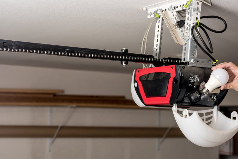 Garage door opener with light bulb