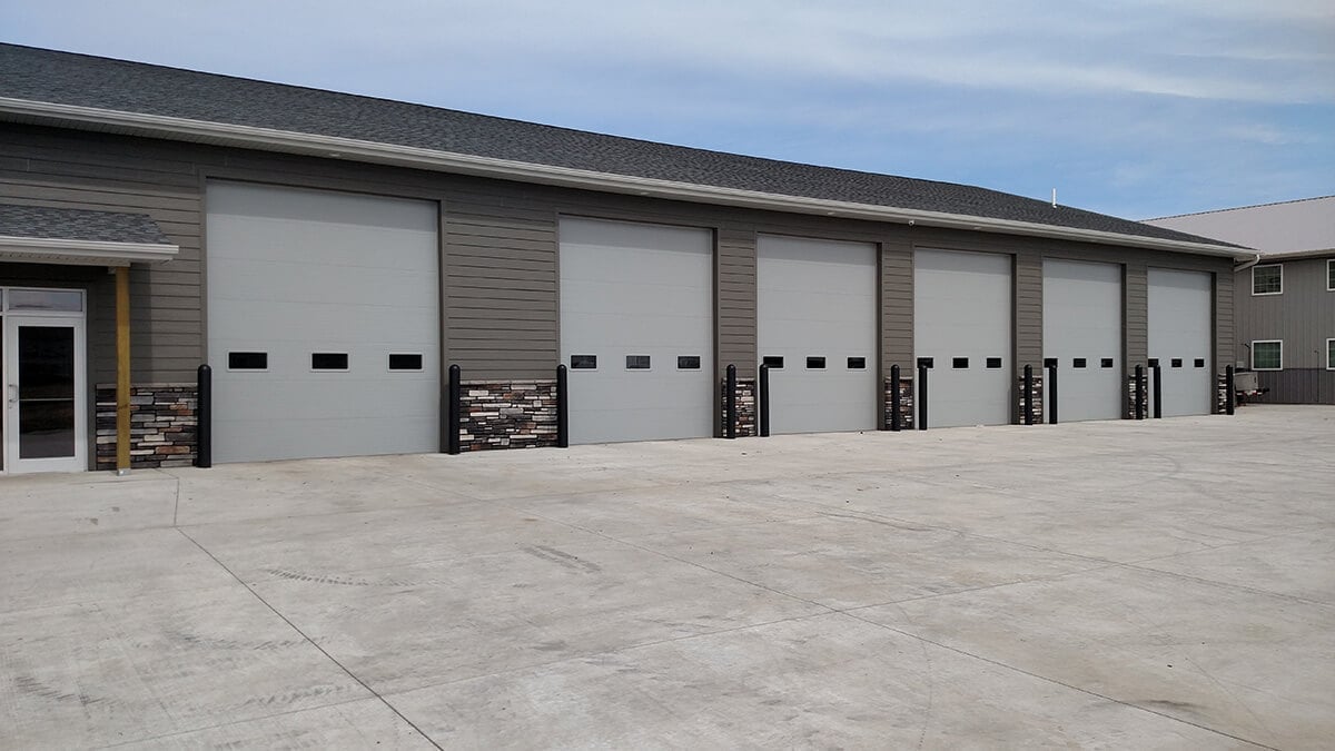 Commercial garage building with multiple overhead doors in Coquitlam BC for Tri-Cities Areas businesses