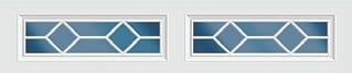 Two horizontal transom windows with geometric diamond pattern design in navy blue and white