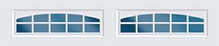 Two white garage door windows with blue arched panes arranged in rows