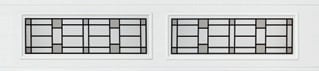 Two rectangular window frames with grid patterns divided into multiple panes