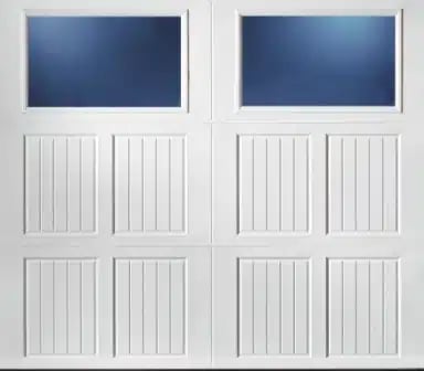 Two white garage doors with rectangular blue windows and vertical panel sections