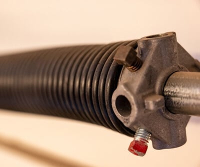 Professional garage door spring repair in Coquitlam with safety-focused torsion spring replacement