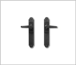 Pair of black ornate door handle lever sets with decorative backplates shown against a light background