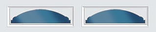 Two blue arched window transoms with gray frames on white background