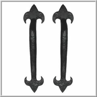 Pair of black ornate metal door handles with curved terminals and decorative fleur-de-lis style finials